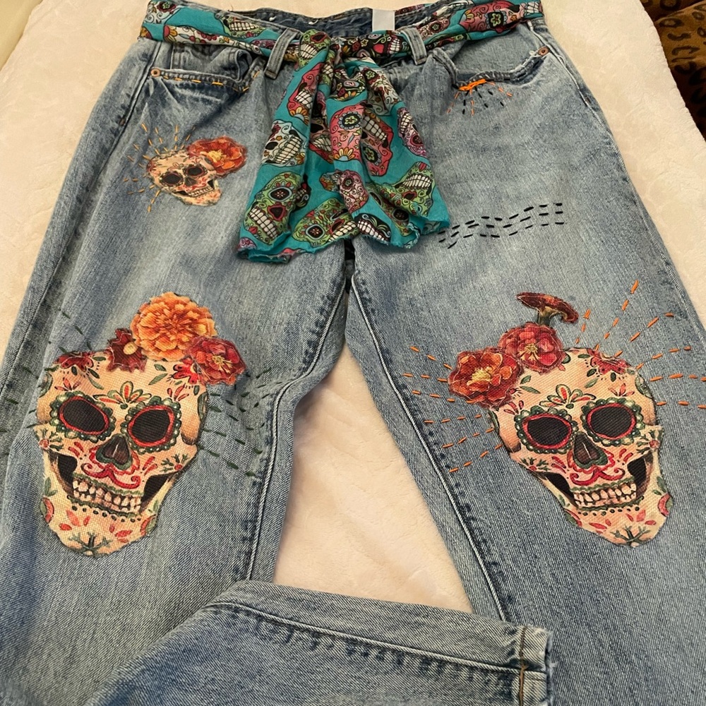 Vibrant Skull Embroidered Blue Jeans with Colorful Belt